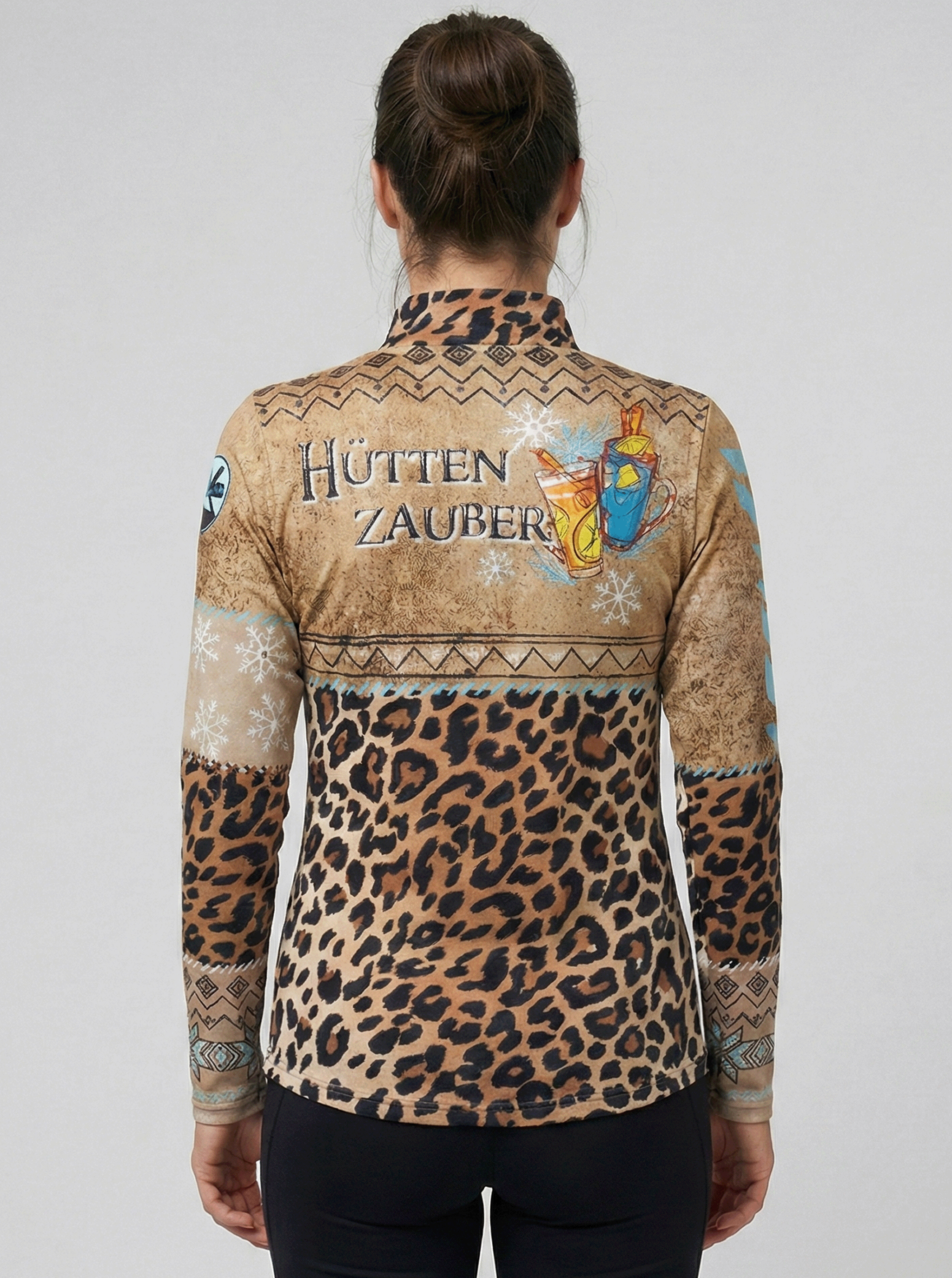 Gutski dames skipully voorkant met panterprint en turquoise accenten.